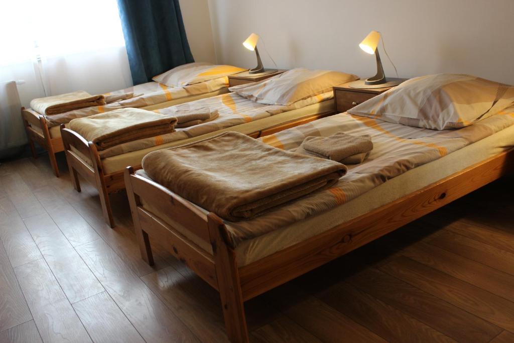 Postel nebo postele na pokoji v ubytování Dom Pielgrzyma