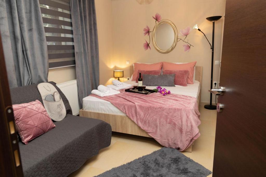Un pat sau paturi într-o cameră la Vivi 's guesthouse