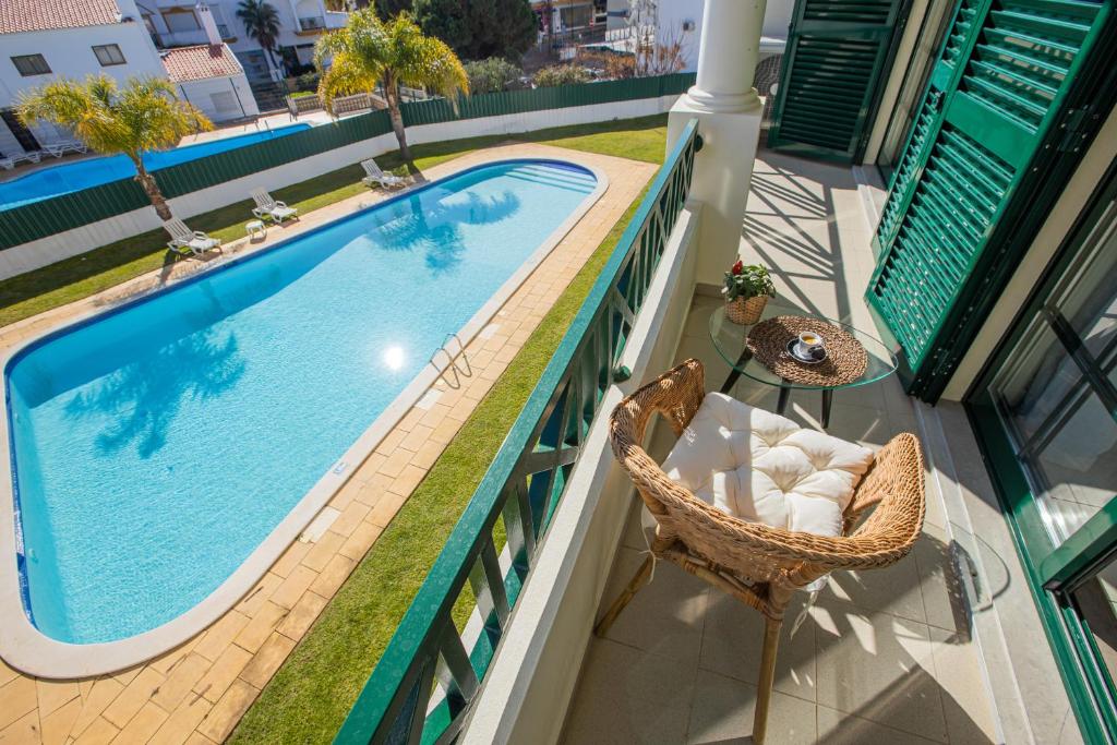 an image of a swimming pool on a balcony at Holiday Albufeira in Albufeira