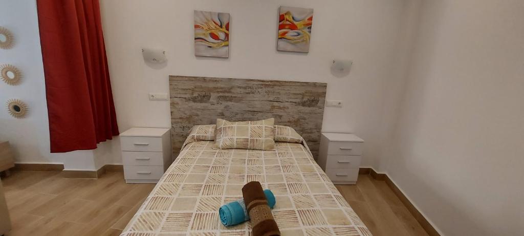 Posteľ alebo postele v izbe v ubytovaní El rincón de Margo
