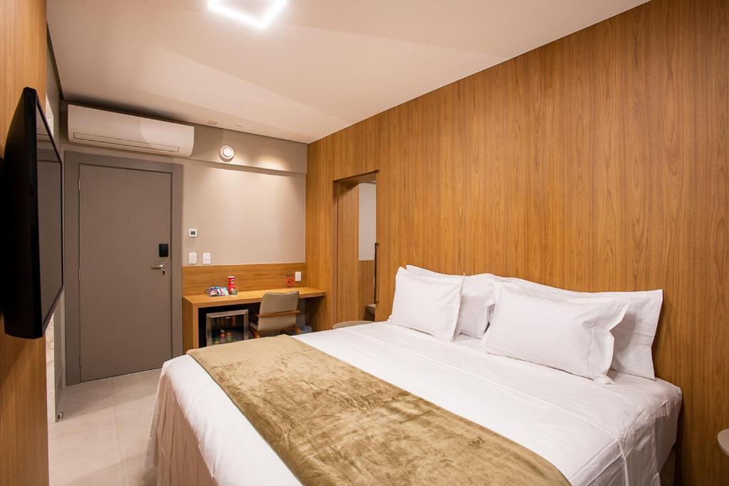 Postel nebo postele na pokoji v ubytování Amazon Aeroporto Hotel