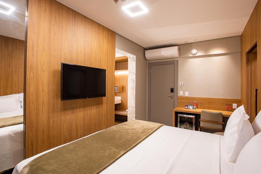 Postel nebo postele na pokoji v ubytování Amazon Aeroporto Hotel