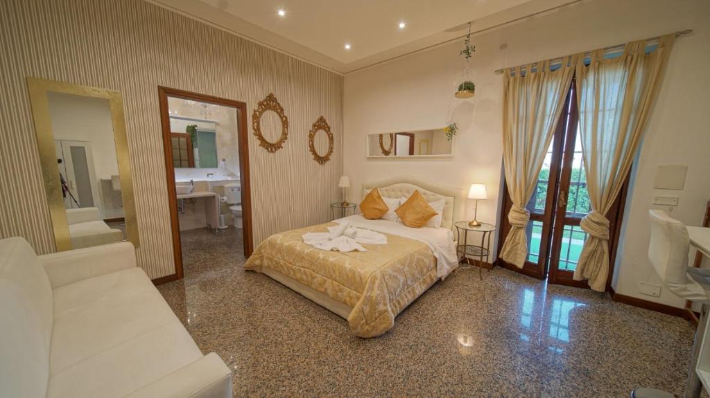 Postel nebo postele na pokoji v ubytování Vitti's Home Verona