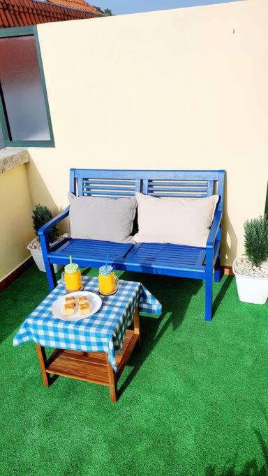 A bed or beds in a room at atico a 500m del mar con plaza de garaje y gran terraza