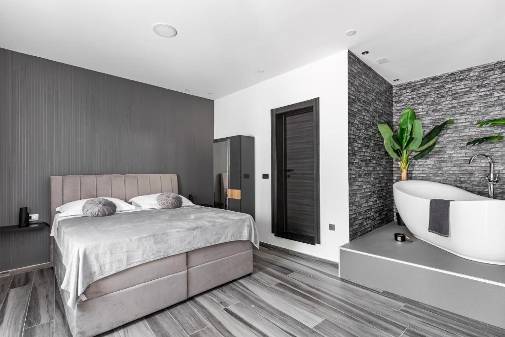Postel nebo postele na pokoji v ubytování Luxury room Ekstaza