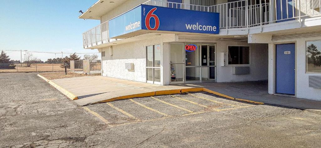 a welcome sign on the side of a building at Motel 6-Goodland, KS in Goodland