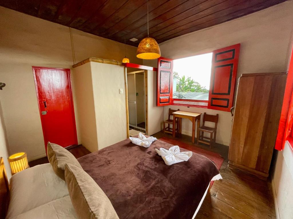 Llit o llits en una habitació de Hostal Tralala Salento