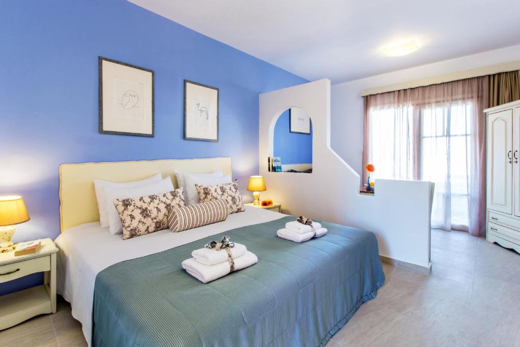 Postel nebo postele na pokoji v ubytování Agrimia Holiday Apartments