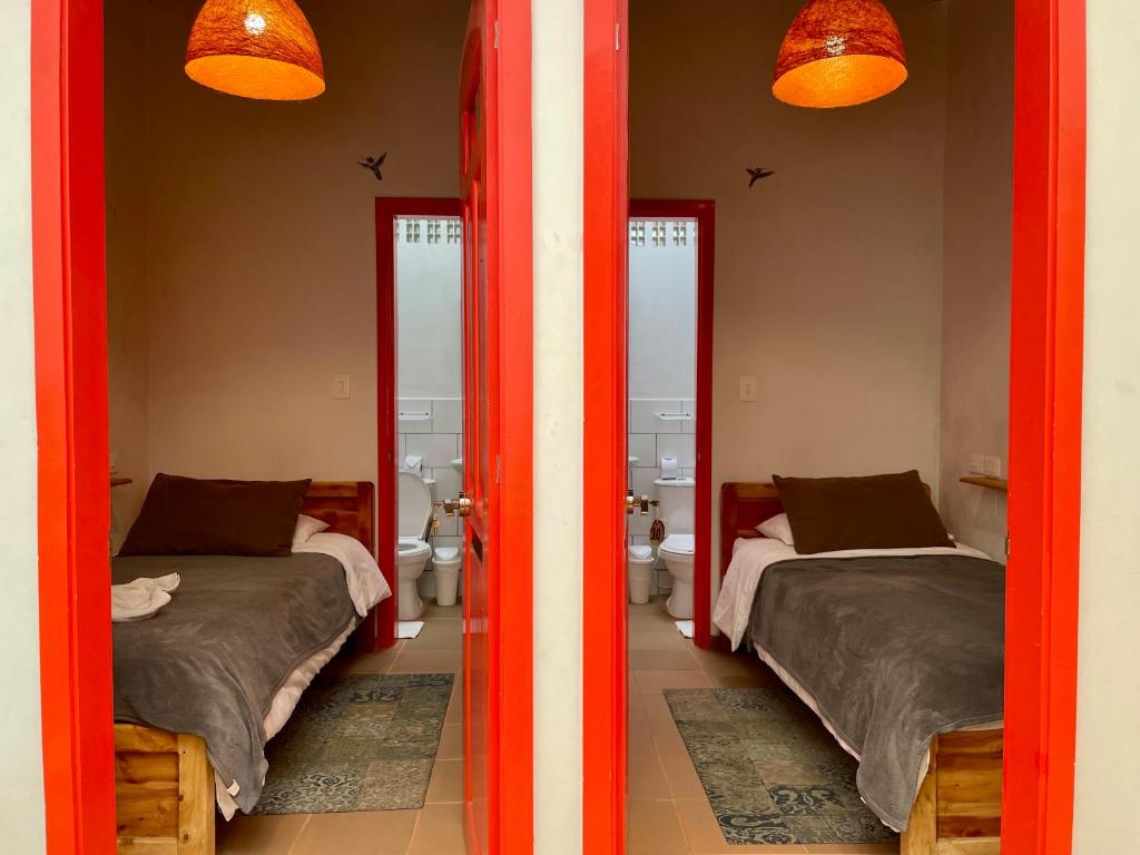 Llit o llits en una habitació de Hostal Tralala Salento
