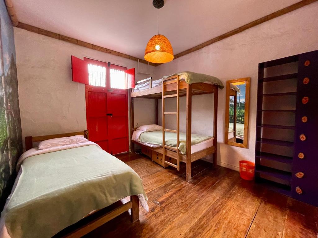 Llit o llits en una habitació de Hostal Tralala Salento