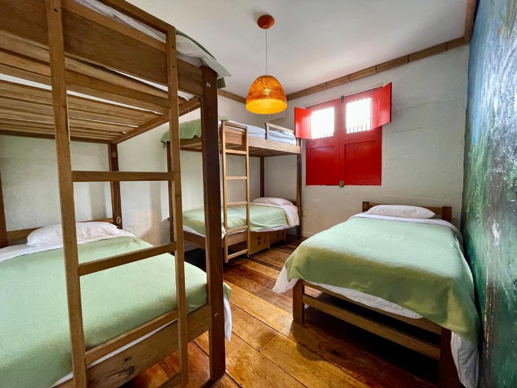 Llit o llits en una habitació de Hostal Tralala Salento