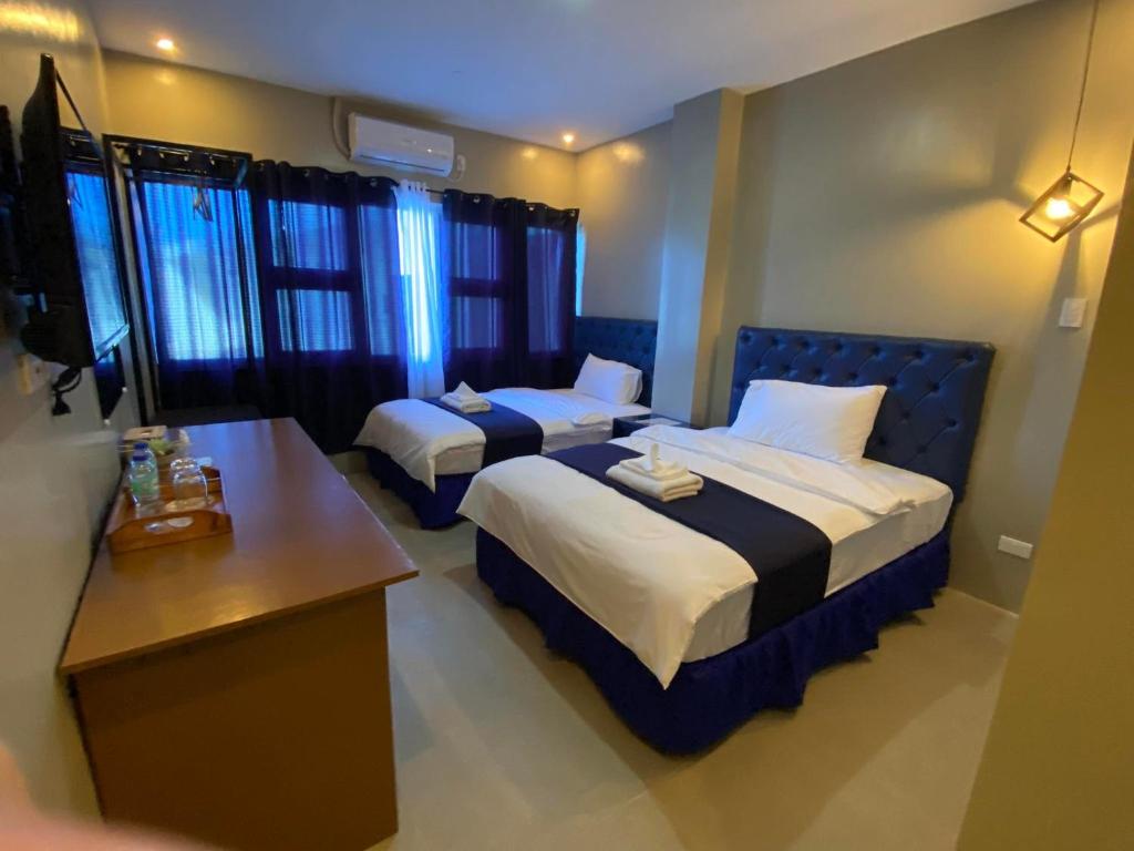 MARINA MARINDQUE HOTEL AND RESORT - 標準的なファミリールーム