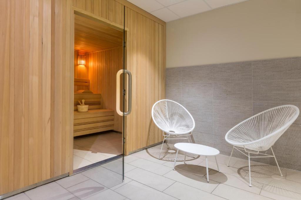 Postel nebo postele na pokoji v ubytování Best Western Plus Hôtel Escapade Senlis