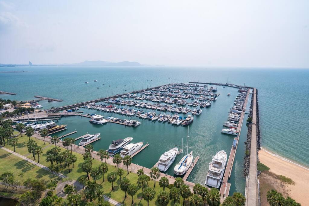 an aerial view of a marina with boats in the water at Ocean Portofino/Luxury2BR/153SQM in Na Jomtien