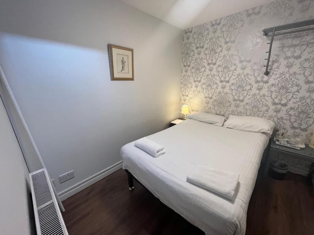 Postel nebo postele na pokoji v ubytování Park View Rooms