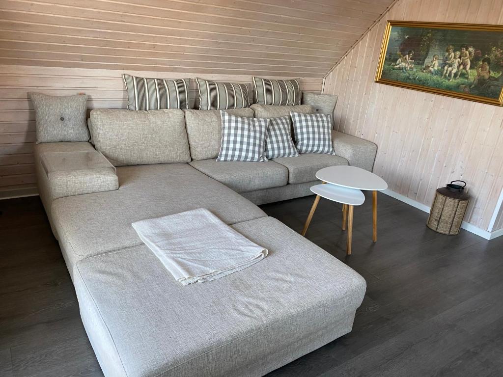 Posezení v ubytování feriehus med havudsigt
