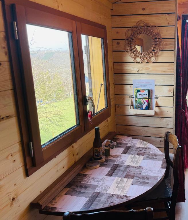 Postel nebo postele na pokoji v ubytování La Rouloulotte