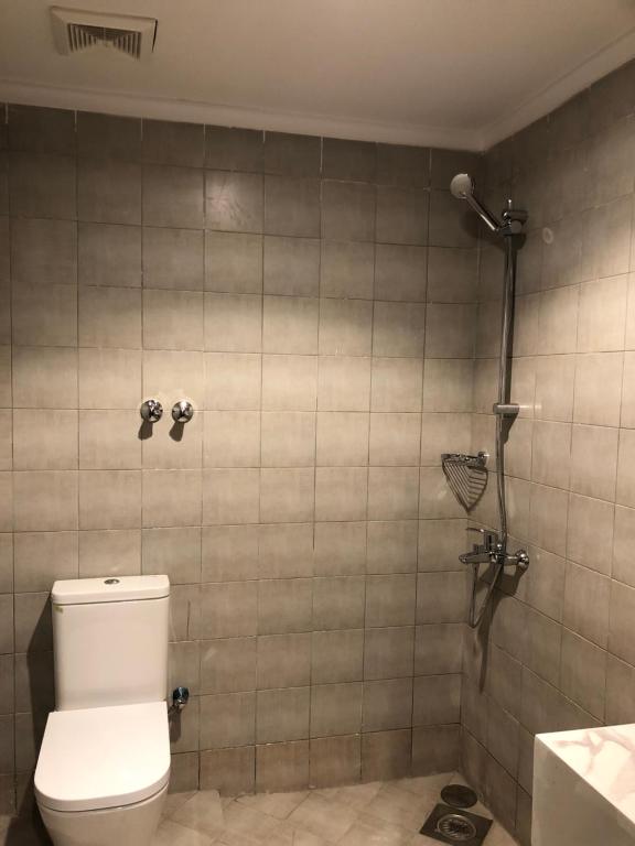 Koupelna v ubytování سنت العزيزيه