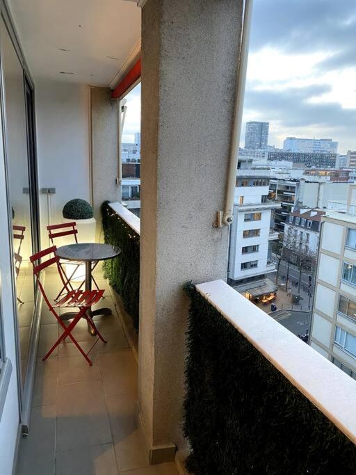 Balkón alebo terasa v ubytovaní Le Suffren-Eiffel Appartement