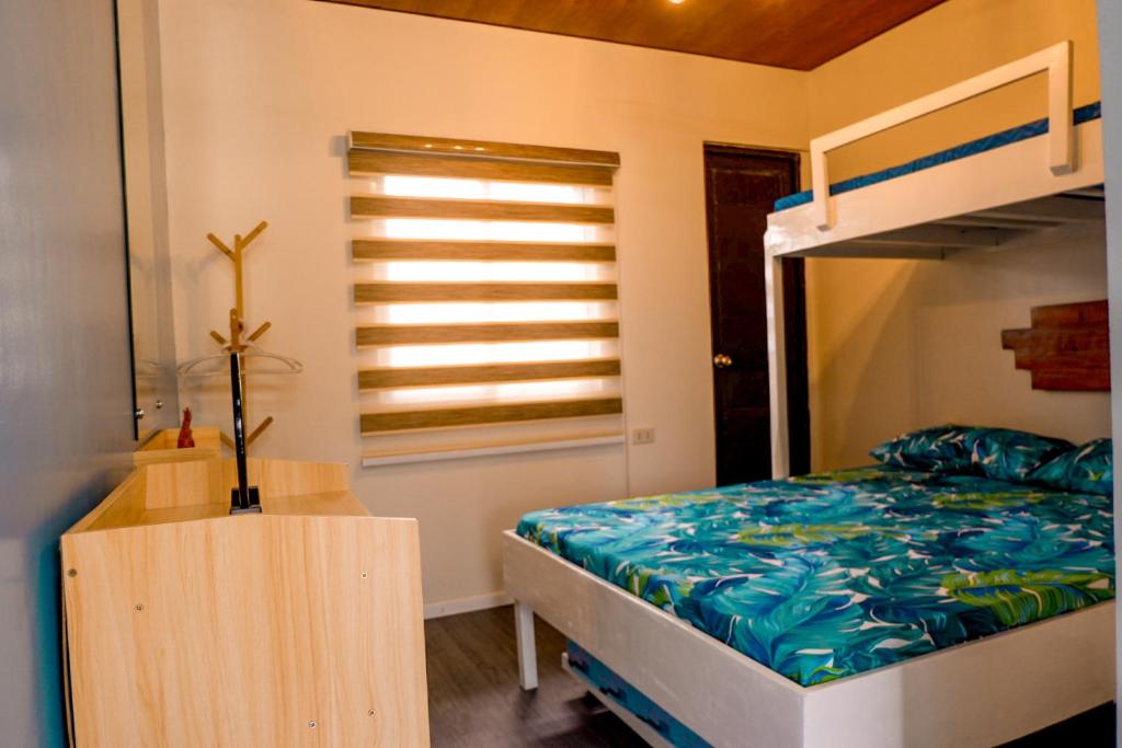 Postel nebo postele na pokoji v ubytování Puffer Isle Resort