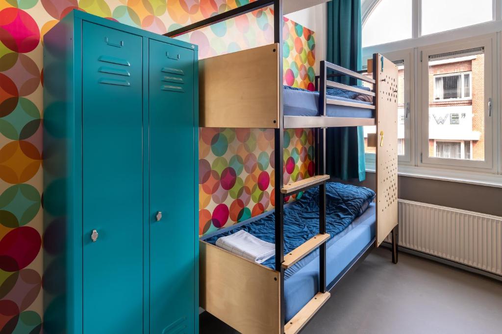 Postel nebo postele na pokoji v ubytování Stayokay Hostel Den Haag