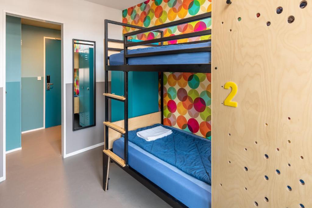 Postel nebo postele na pokoji v ubytování Stayokay Hostel Den Haag