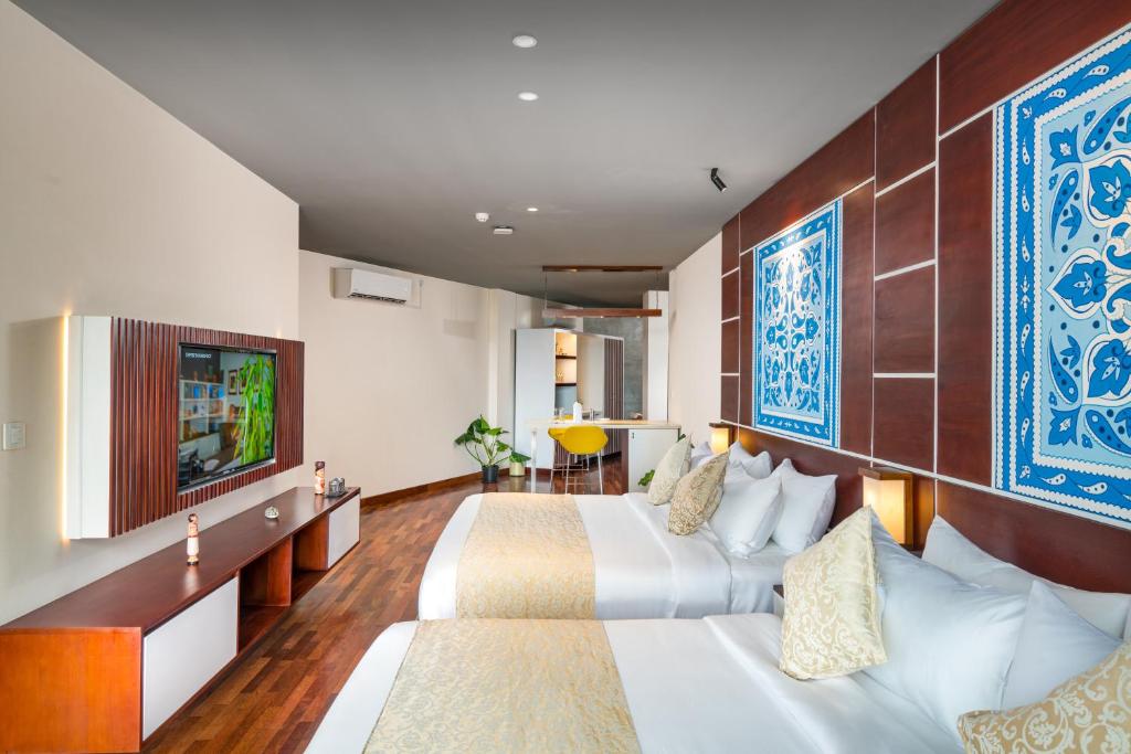 TV a/nebo společenská místnost v ubytování Grand Serendib Hotel