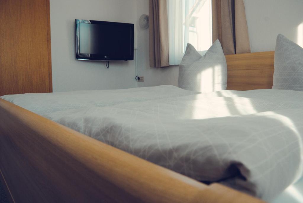 Postel nebo postele na pokoji v ubytování Pension Morgenweck