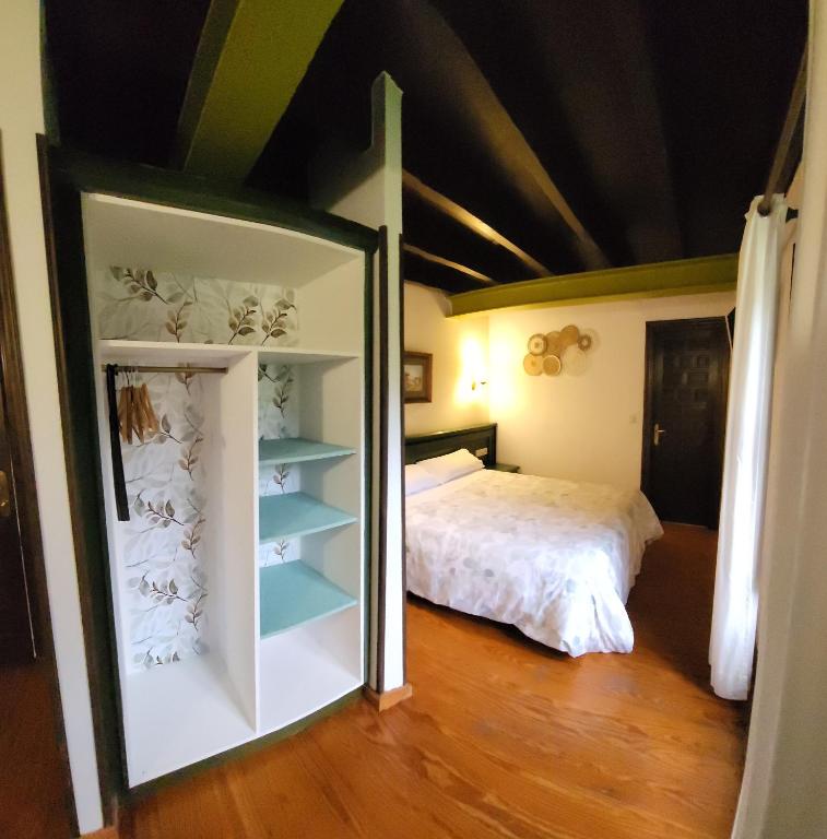 Postel nebo postele na pokoji v ubytování Amaicha Casona