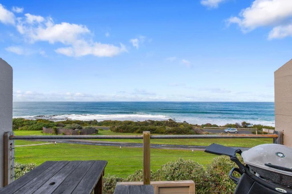 a view of the ocean from the balcony of a house at Ocean View Apartments at Whitecrest Great Ocean Road Resort in Apollo Bay