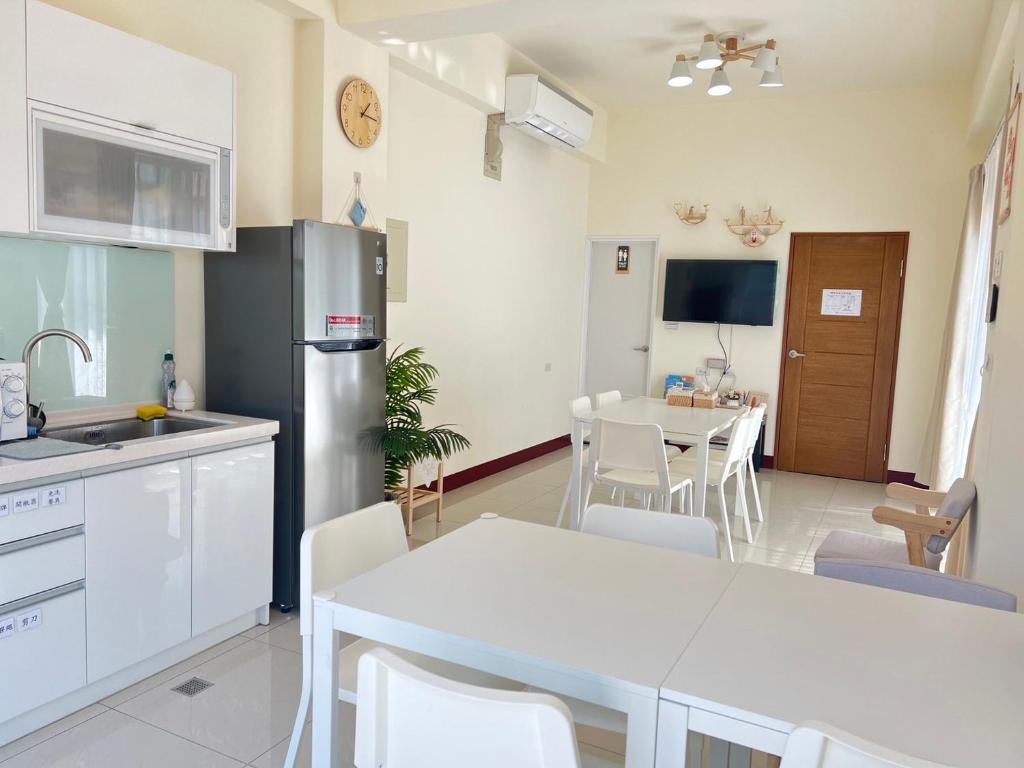 Kuchyň nebo kuchyňský kout v ubytování Hourlight Homestay