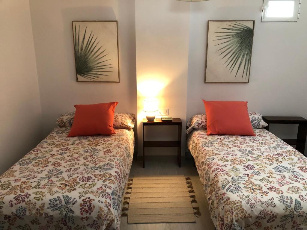 Un pat sau paturi într-o cameră la La casita