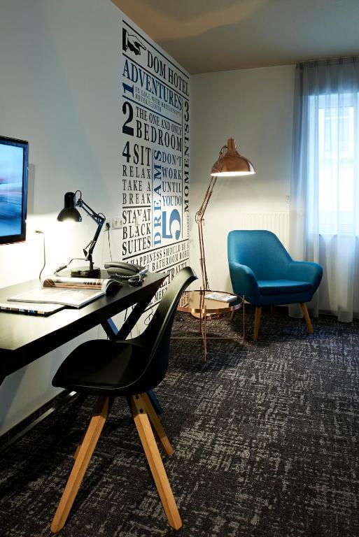 TV a/nebo společenská místnost v ubytování Dom Hotel