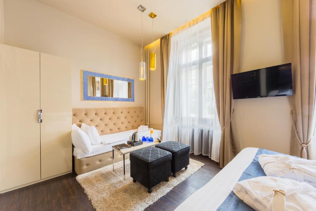 Łóżko lub łóżka w pokoju w obiekcie Design Hotel Jewel Prague