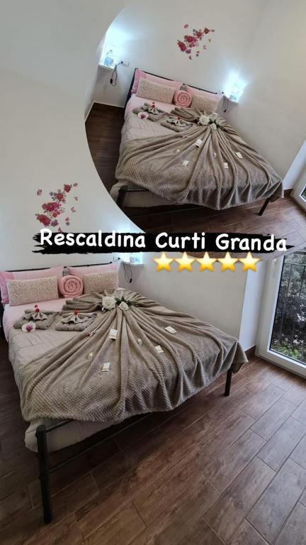 Postel nebo postele na pokoji v ubytování Curti Granda