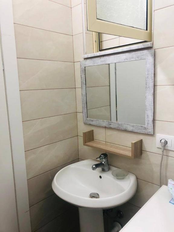 Koupelna v ubytování Rezidenca SHOPI Apartments