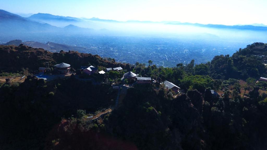 an aerial view of a village on a mountain at Rock Garden Resort in Pokhara