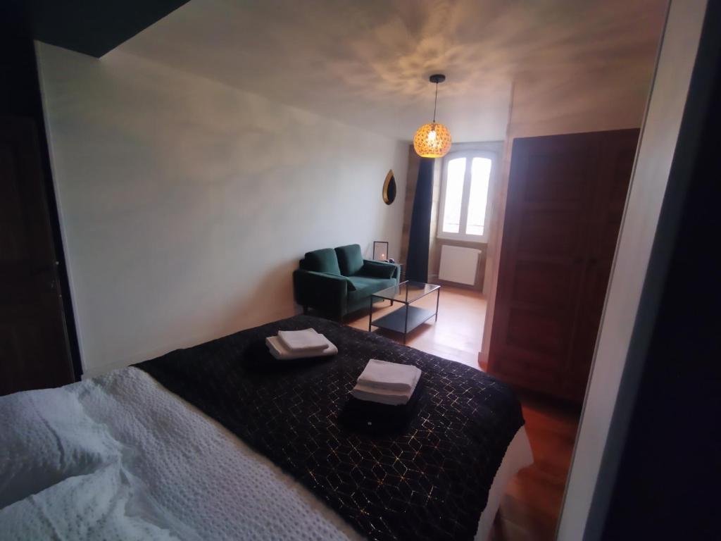 Postel nebo postele na pokoji v ubytování Le Pressoir chambres d'hôtes