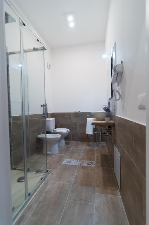 Koupelna v ubytování RAUDINO ROOMS