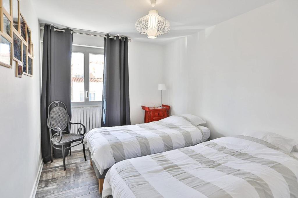 Posteľ alebo postele v izbe v ubytovaní Appartement Moderne & Confort Accès Plage et Commerces