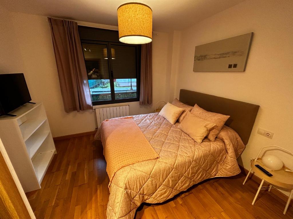 Postel nebo postele na pokoji v ubytování Piso Noray