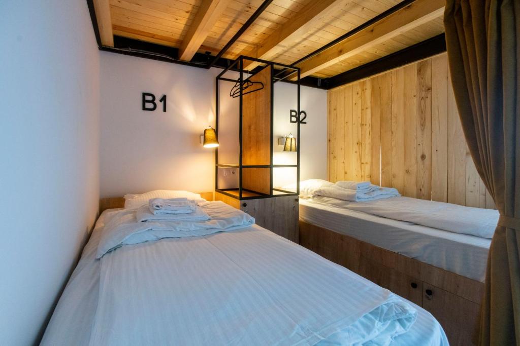 Postel nebo postele na pokoji v ubytování Khada Hostel