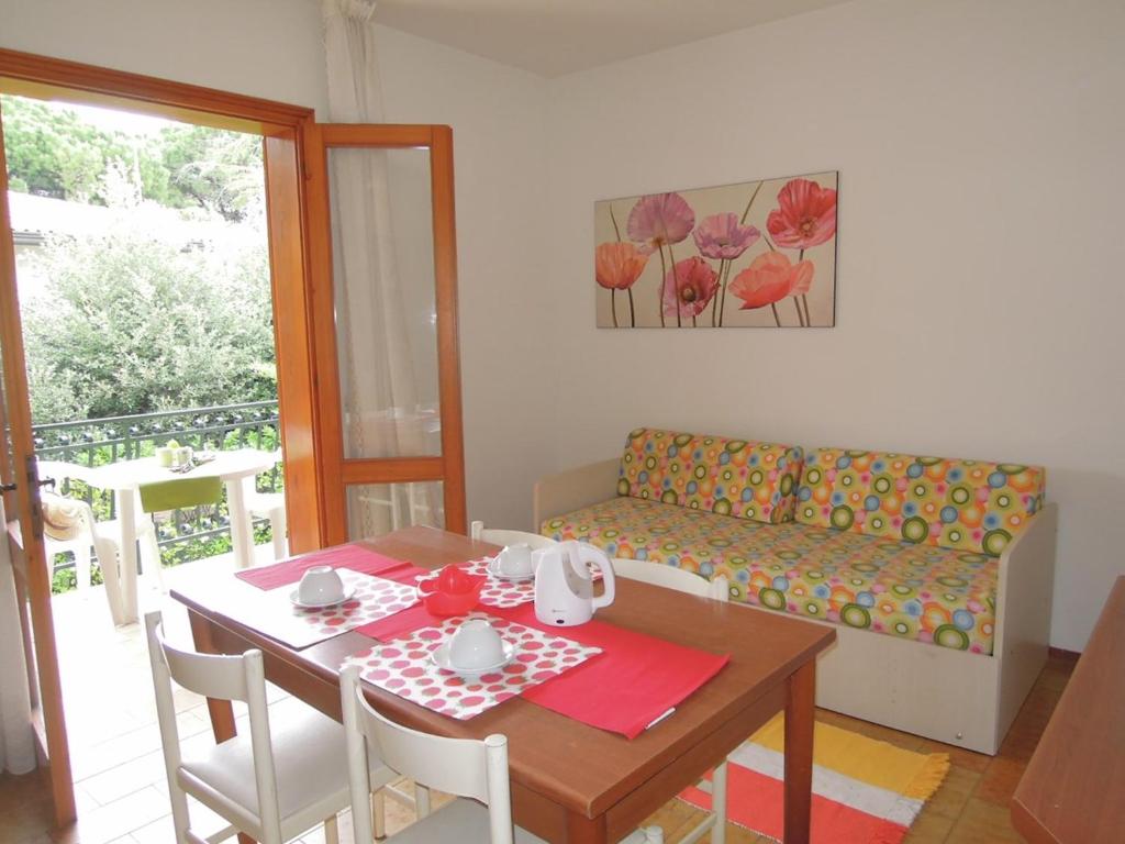 A seating area at Villa with garden and barbeque 250m from the sea