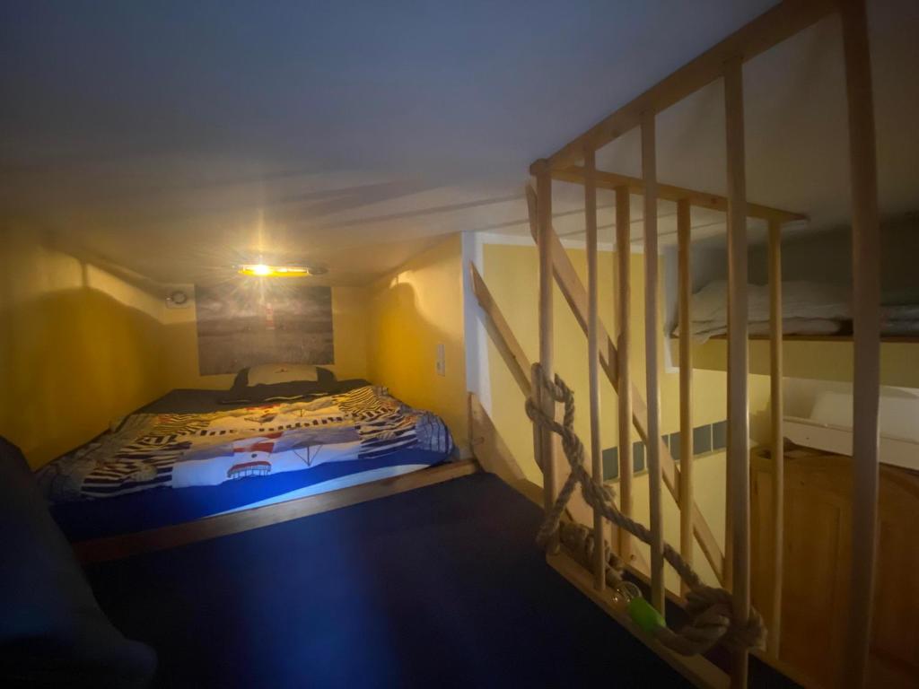 Postel nebo postele na pokoji v ubytování Ferienwohnung Saarleuchtturm