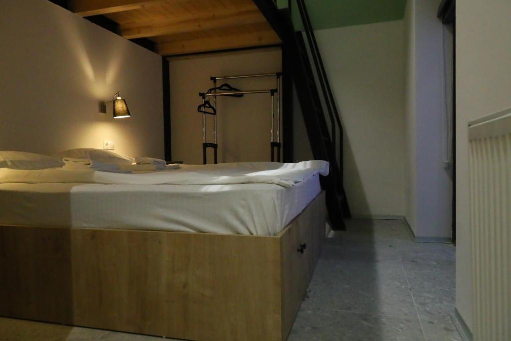 Postel nebo postele na pokoji v ubytování Khada Hostel