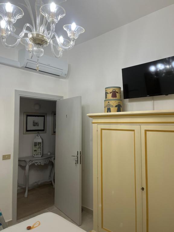 Televízia a/alebo spoločenská miestnosť v ubytovaní Affittacamere Il Piccolo Borgo Foligno