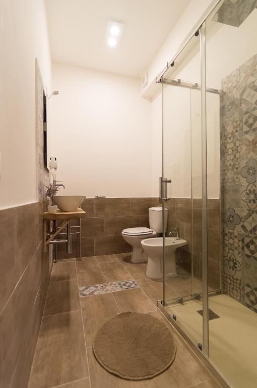 Koupelna v ubytování RAUDINO ROOMS