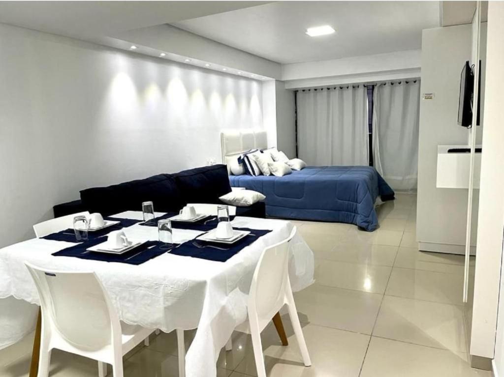 Ένα ή περισσότερα κρεβάτια σε δωμάτιο στο FLAT MARINAS PRAIA HOTEL