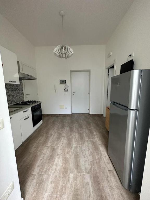 Kuchyň nebo kuchyňský kout v ubytování RAUDINO ROOMS