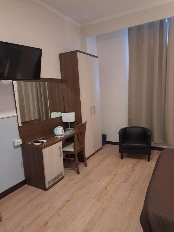 Kuchyň nebo kuchyňský kout v ubytování Hotel Leone